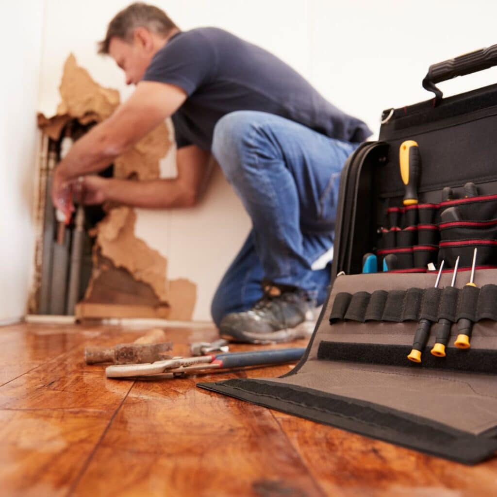 performing plumbing repairs