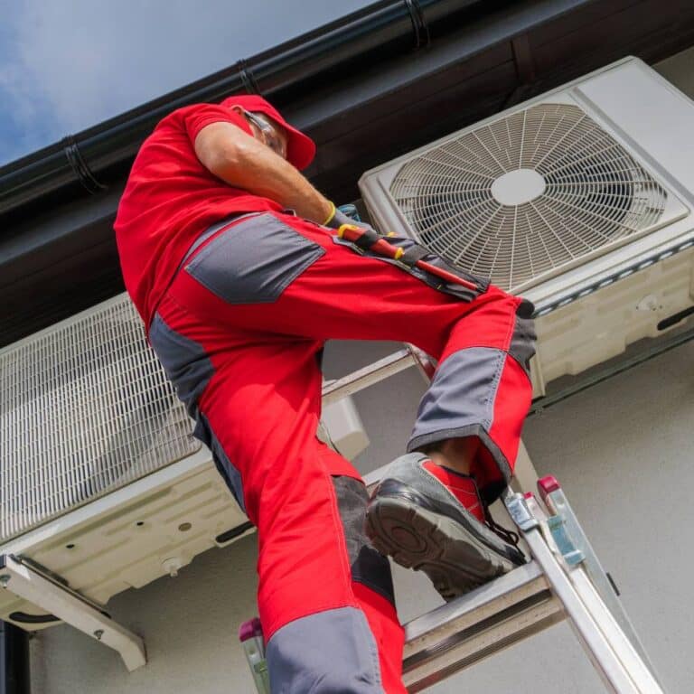 technician working on hvac system