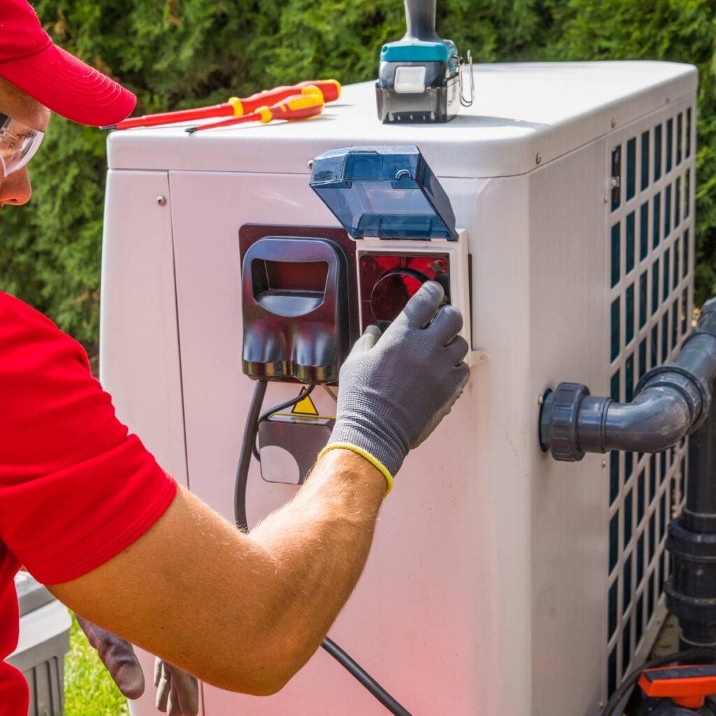 hvac technician finishing up an hvac installation service