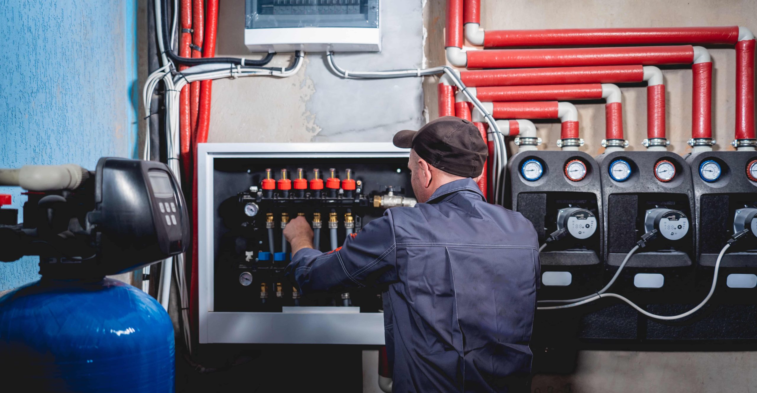 hvac technician performing air duct maintenance