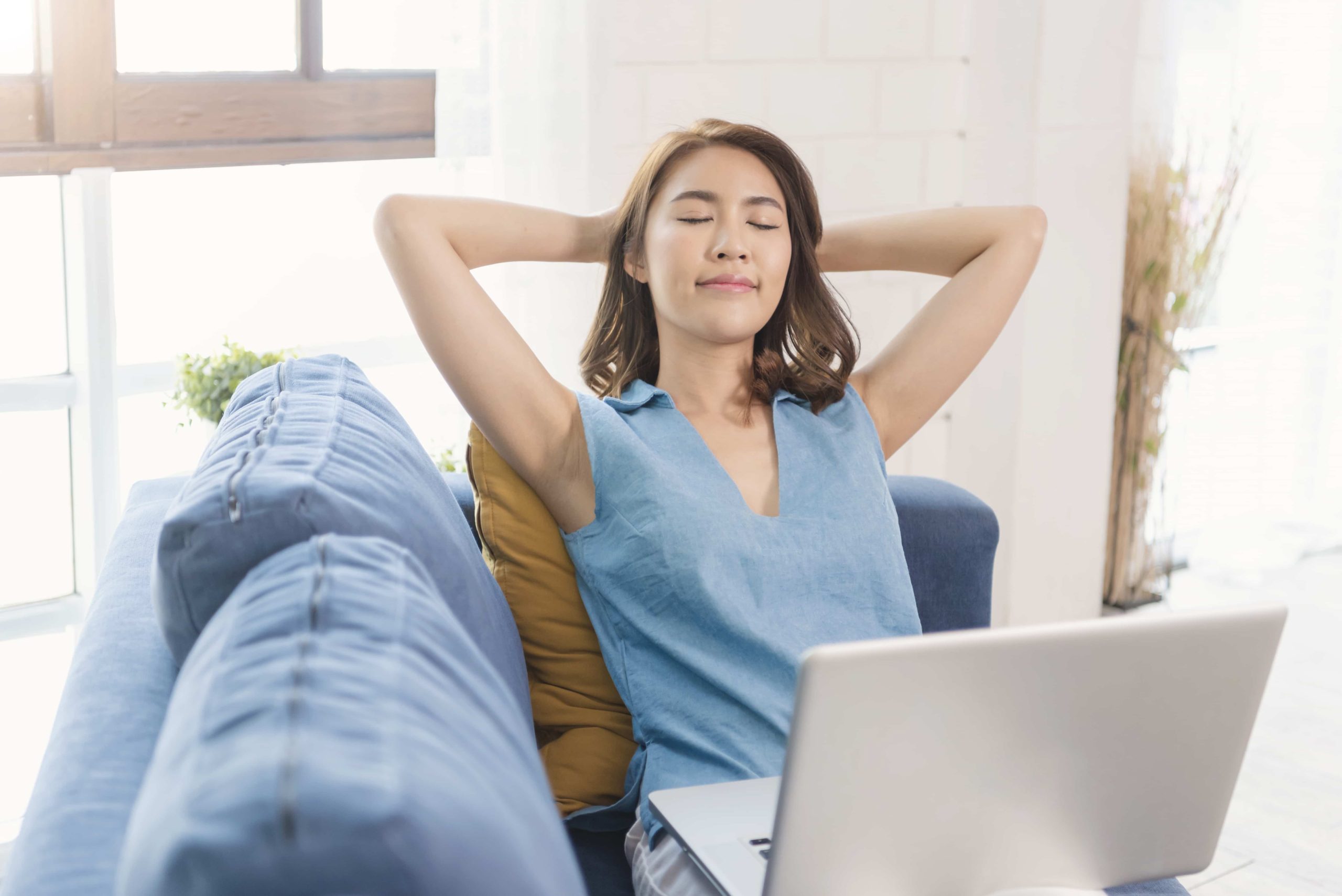 woman relaxing on couch