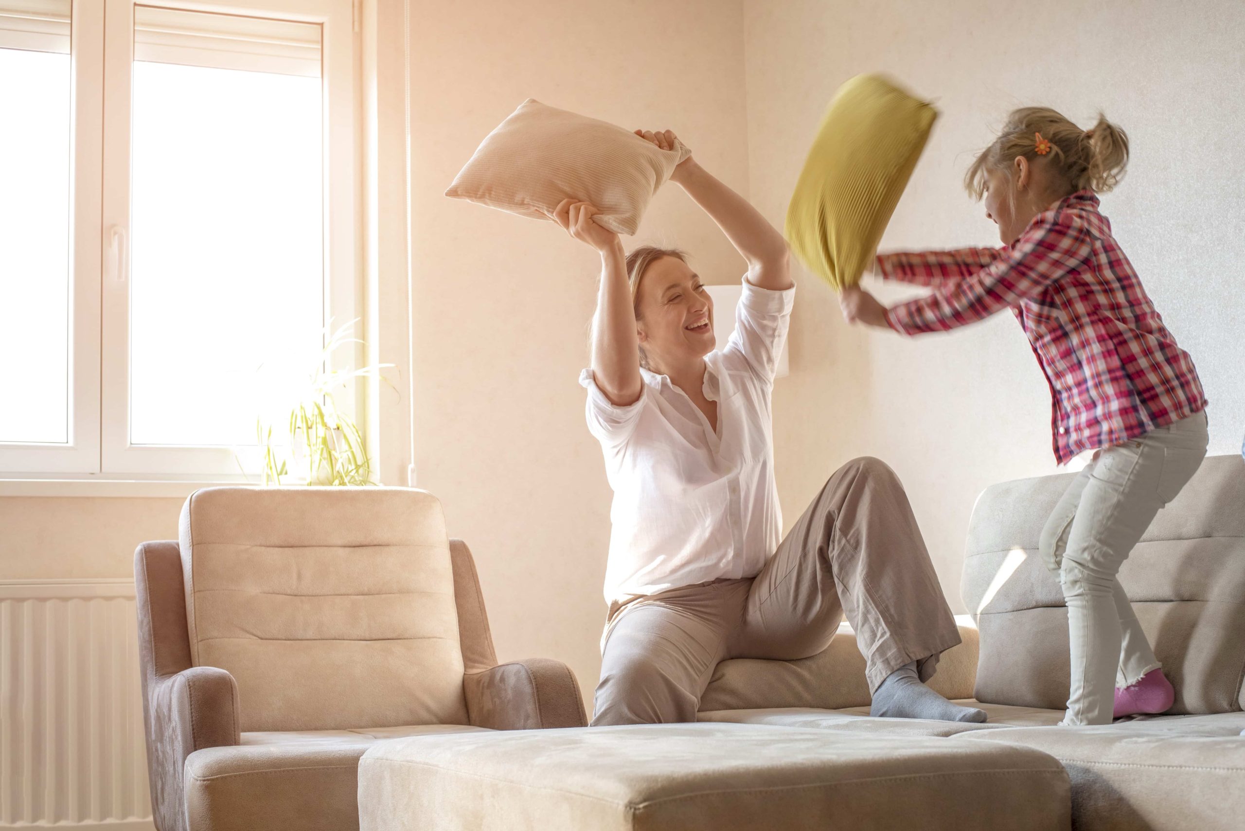 family having fun after having their ac repaired
